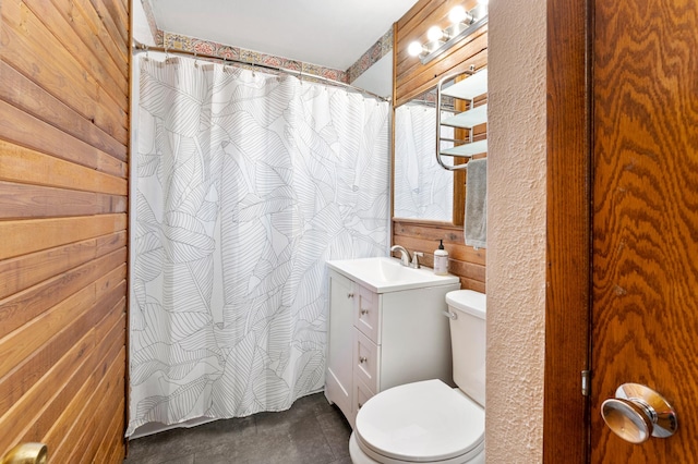 19172 Front Blvd NE, East Bethel, MN 55092 - bathroom featuring vanity, wooden walls, and curtained shower
