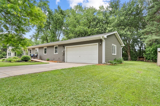 19172 Front Blvd NE, East Bethel, MN 55092 - ranch-style home featuring concrete driveway, an attached garage, and a front yard