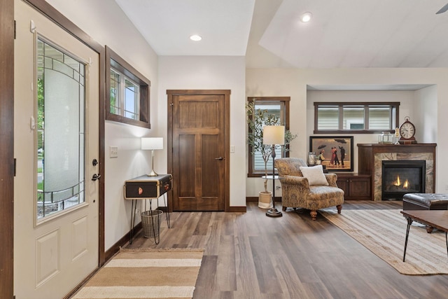 98 Tribute Ave, Hudson, WI 54016 - foyer featuring wood finished floors, plenty of natural light, and a high end fireplace