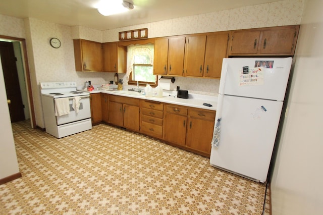 24195 Center St E, Mayfield Twp, MN 56701 - kitchen with white appliances, brown cabinetry, wallpapered walls, light countertops, and light flooring