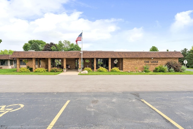 1200 18th Ave NW Unit 132, Austin, MN 55912 - view of building exterior featuring uncovered parking