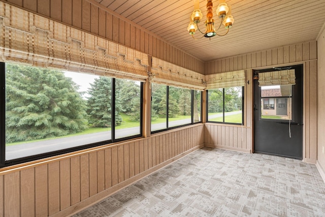 1200 18th Ave NW Unit 132, Austin, MN 55912 - unfurnished sunroom with a chandelier and healthy amount of natural light