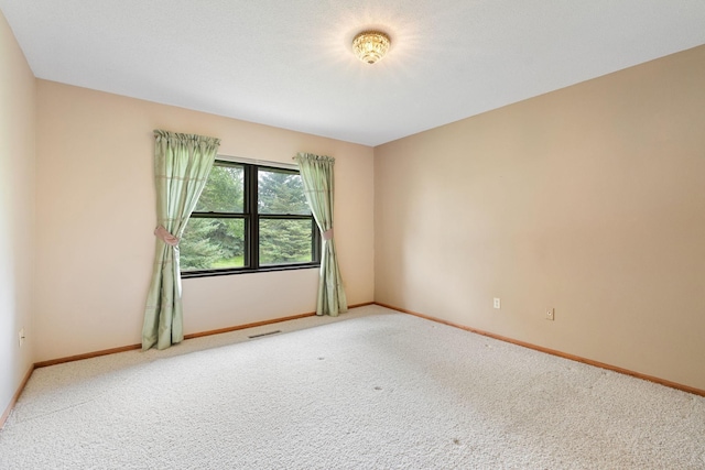 1200 18th Ave NW Unit 132, Austin, MN 55912 - unfurnished room featuring carpet floors and baseboards