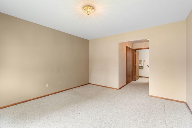 1200 18th Ave NW Unit 132, Austin, MN 55912 - unfurnished room featuring light carpet