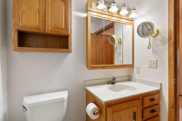 1200 18th Ave NW Unit 132, Austin, MN 55912 - bathroom featuring toilet and vanity