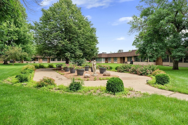 1200 18th Ave NW Unit 132, Austin, MN 55912 - view of home's community featuring a lawn