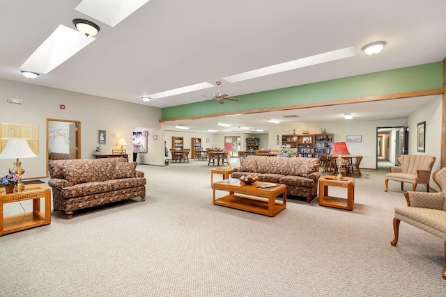 1200 18th Ave NW Unit 132, Austin, MN 55912 - carpeted living area featuring a skylight and ceiling fan