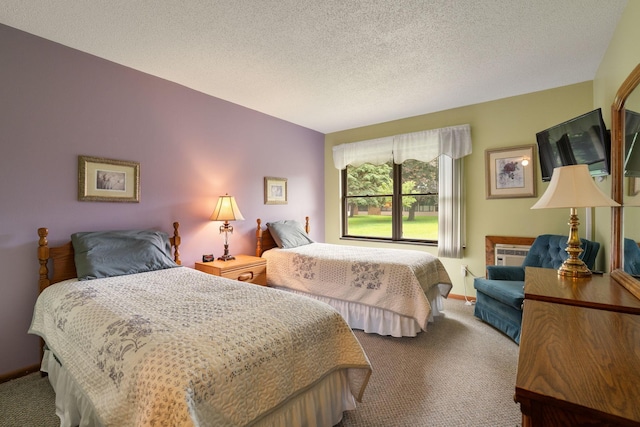 1200 18th Ave NW Unit 132, Austin, MN 55912 - bedroom featuring carpet floors and a textured ceiling