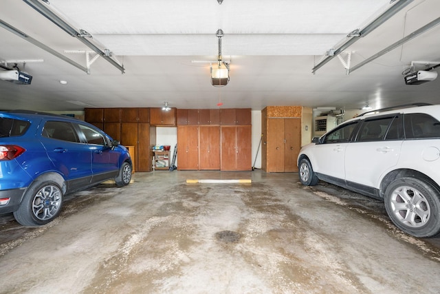1200 18th Ave NW Unit 132, Austin, MN 55912 - garage featuring a garage door opener