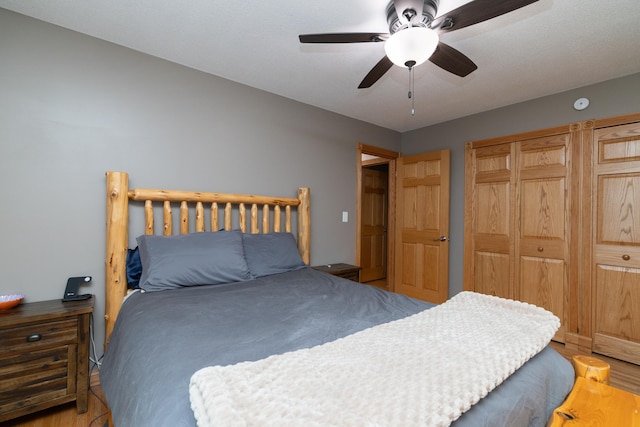 728 Linn St N, Prescott, WI 54021 - bedroom with wood finished floors, a closet, and ceiling fan