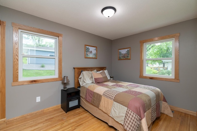 728 Linn St N, Prescott, WI 54021 - bedroom featuring light wood finished floors