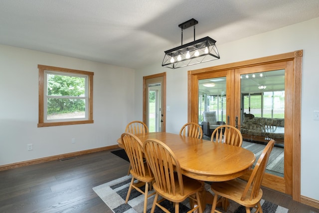 728 Linn St N, Prescott, WI 54021 - dining room with baseboards and dark wood-type flooring