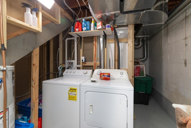 728 Linn St N, Prescott, WI 54021 - washroom featuring washer and clothes dryer and concrete block wall