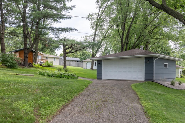 728 Linn St N, Prescott, WI 54021 - view of grassy yard with a garage and an outbuilding