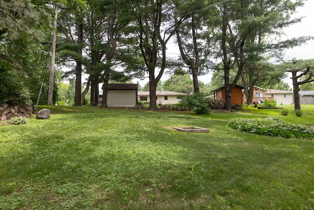 728 Linn St N, Prescott, WI 54021 - view of green lawn with a fire pit