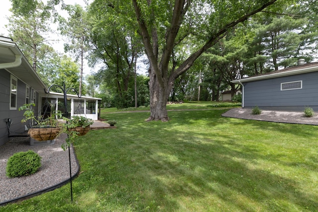 728 Linn St N, Prescott, WI 54021 - view of grassy yard featuring a sunroom