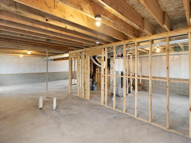 6706 376th St, North Branch, MN 55056 - unfinished basement featuring heating unit and concrete block wall
