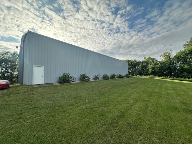 1865 180th St, Norman Twp, MN 56220 - view of green lawn with a pole building and an outbuilding