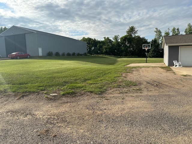 1865 180th St, Norman Twp, MN 56220 - view of grassy yard featuring an outbuilding