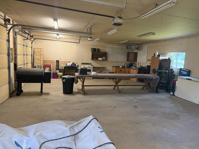 1865 180th St, Norman Twp, MN 56220 - garage featuring a garage door opener