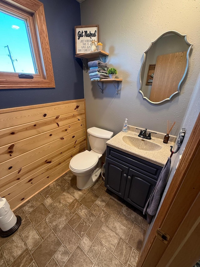 1865 180th St, Norman Twp, MN 56220 - half bathroom with vanity and stone finish flooring