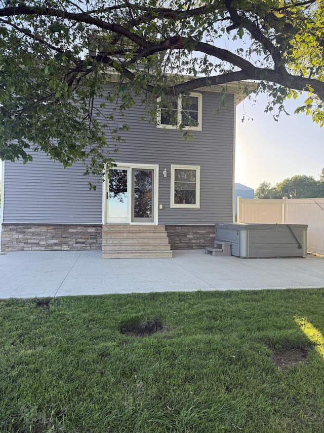 1865 180th St, Norman Twp, MN 56220 - rear view of property featuring entry steps and a patio area