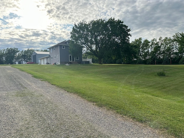 1865 180th St, Norman Twp, MN 56220 - view of grassy yard featuring driveway