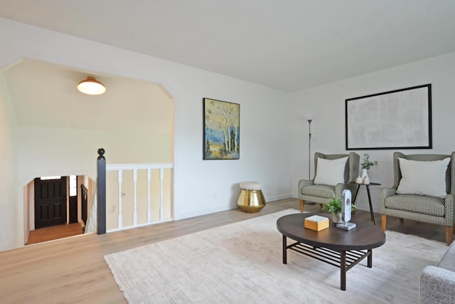 10419 Goldenrod St NW, Coon Rapids, MN 55448 - living room featuring light wood-style flooring and baseboards
