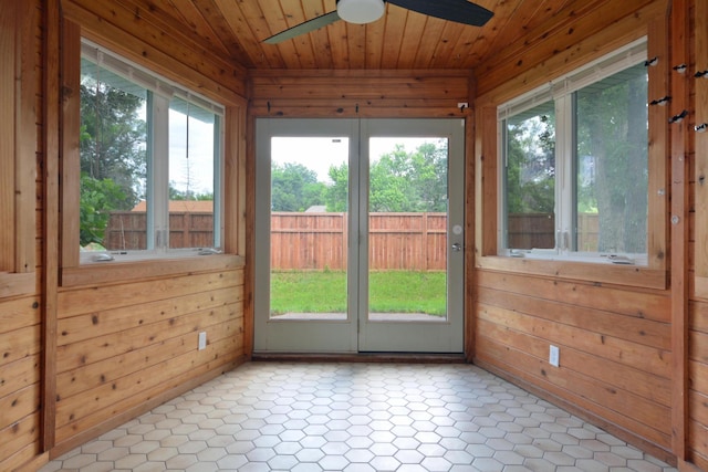 10419 Goldenrod St NW, Coon Rapids, MN 55448 - unfurnished sunroom with wood walls, wooden ceiling, and french doors