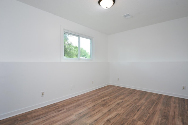 10419 Goldenrod St NW, Coon Rapids, MN 55448 - empty room with wood finished floors and baseboards