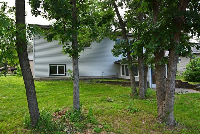 10419 Goldenrod St NW, Coon Rapids, MN 55448 - view of home's exterior featuring a yard