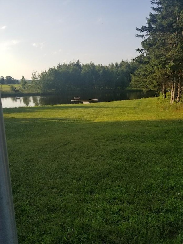 N5172 County Road O, Atlanta Twp, WI 54819 - view of home's community featuring a water view and a yard