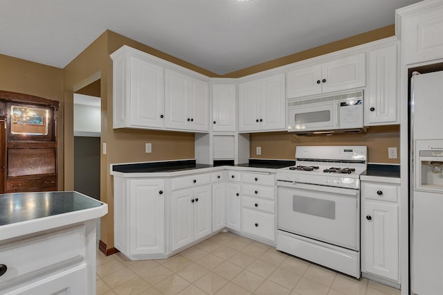 213 2nd St N, Cold Spring, MN 56320 - kitchen featuring white appliances, white cabinetry, and dark countertops