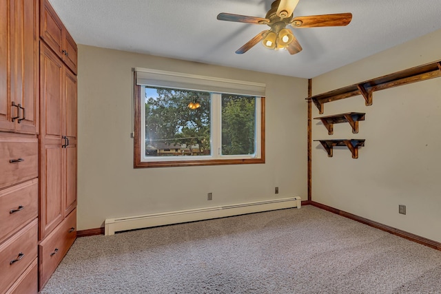 213 2nd St N, Cold Spring, MN 56320 - unfurnished bedroom featuring a baseboard radiator, carpet, a textured ceiling, and ceiling fan