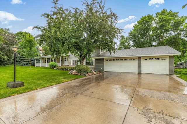 213 2nd St N, Cold Spring, MN 56320 - view of front of home featuring concrete driveway, a front lawn, and an attached garage