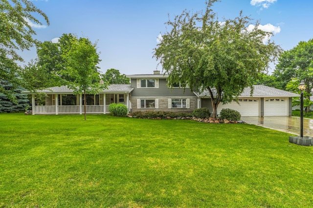 213 2nd St N, Cold Spring, MN 56320 - split level home featuring driveway, a front lawn, a garage, and covered porch