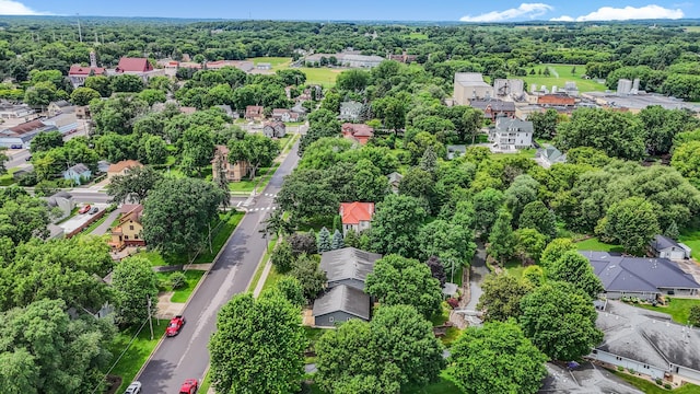 213 2nd St N, Cold Spring, MN 56320 - aerial perspective of suburban area with a heavily wooded area