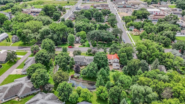 213 2nd St N, Cold Spring, MN 56320 - aerial perspective of suburban area with a tree filled landscape