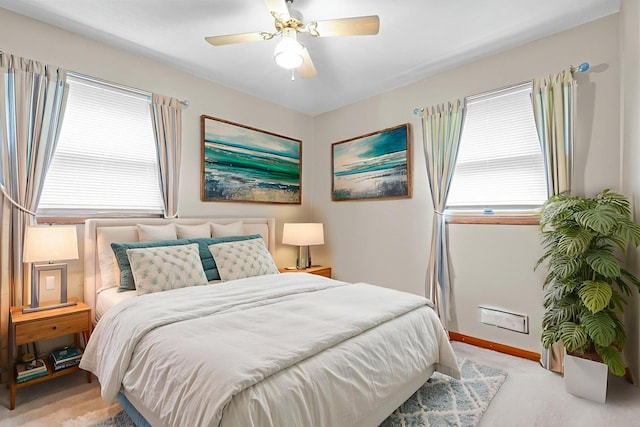 5913 Zenith Ave N, Brooklyn Center, MN 55429 - bedroom with light carpet and ceiling fan