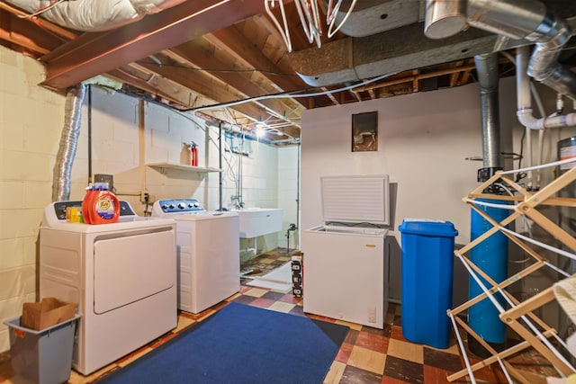 5913 Zenith Ave N, Brooklyn Center, MN 55429 - unfinished basement with washing machine and clothes dryer, tile patterned floors, and refrigerator