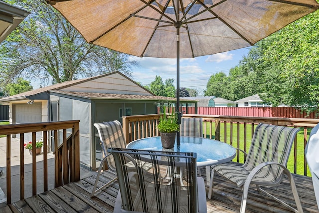 5913 Zenith Ave N, Brooklyn Center, MN 55429 - wooden terrace featuring outdoor dining space