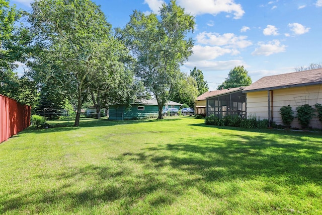 5913 Zenith Ave N, Brooklyn Center, MN 55429 - view of yard with a sunroom