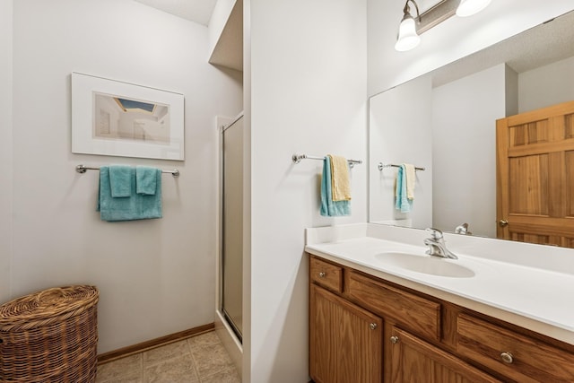 13936 54th Ave N Unit 2, Plymouth, MN 55446 - bathroom with vanity and a stall shower