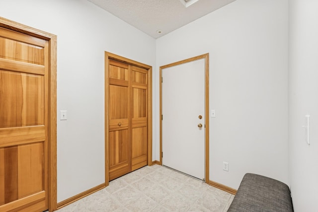 13936 54th Ave N Unit 2, Plymouth, MN 55446 - foyer entrance featuring baseboards and light flooring
