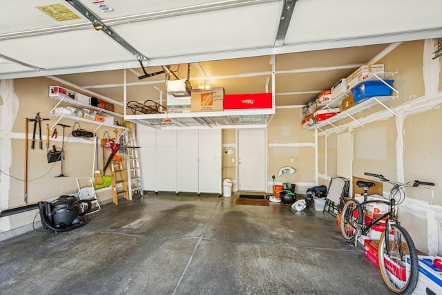 13936 54th Ave N Unit 2, Plymouth, MN 55446 - garage featuring a garage door opener