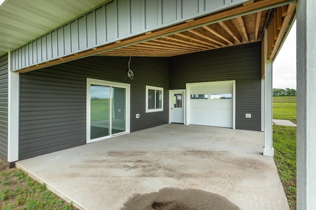 41565 Thunder Rd, Clitherall, MN 56524 - view of patio / terrace with a garage