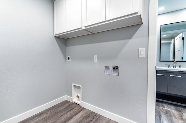41565 Thunder Rd, Clitherall, MN 56524 - laundry room with hookup for an electric dryer, dark wood finished floors, cabinet space, and hookup for a washing machine