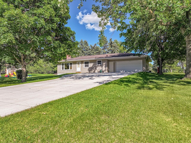 1007 Ruby St NW, Alexandria, MN 56308 - view of front of house with a garage, a front lawn, driveway, and a chimney