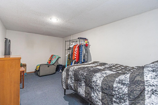 1007 Ruby St NW, Alexandria, MN 56308 - carpeted bedroom with a textured ceiling