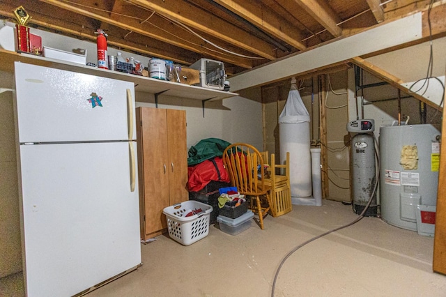 1007 Ruby St NW, Alexandria, MN 56308 - basement with freestanding refrigerator, electric water heater, and a water softener system